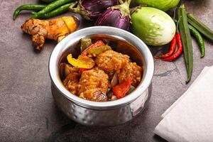 A silver container with food in it photo