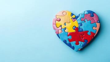 Colorful heart-shaped puzzle pieces arranged on a blue background representing love, unity, and inclusivity in a creative and playful way photo