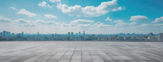Empty concrete floor with cityscape in background photo