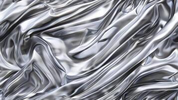 A silver metal surface with waves and swirls photo