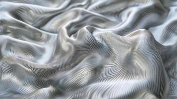 A close up of a silver fabric with wavy lines photo