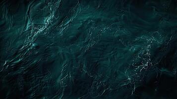 A dark blue ocean with waves and ripples photo