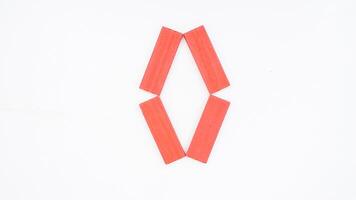 Letter O from red color wood block isolated on white background photo