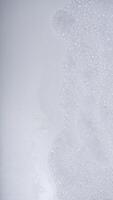 Soap foam or shampoo foam or detergent foam with bubbles isolated on white background photo