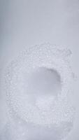 White foam with bubbles from soap isolated on white background photo