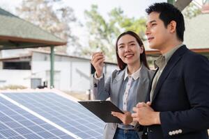 Sustainable business networking. Professionals enthusiastically sharing insights on solar energy solutions. photo