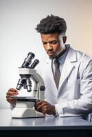 A man in a lab coat looking at a microscope photo