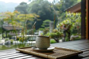 A cup and saucer on a tray on a table photo