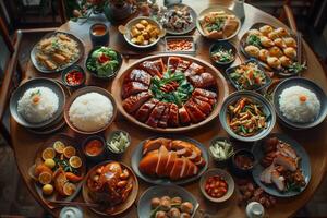 A large round table with many different types of food photo