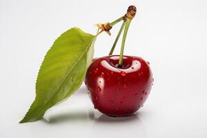 A cherry with a leaf on it and a drop of water photo