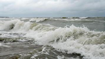 Ocean Waves Crashing Powerfully on Shoreline for Nature Lovers and Travel Enthusiasts Seeking Inspiring Coastal Scenery photo