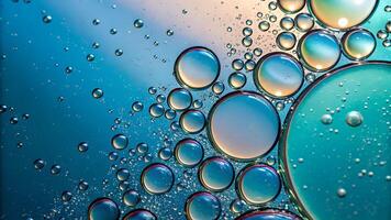 Colorful Bubbles Floating in Water for Creative Designers and Artists, Stunning Macro Photography of Oil Droplets on Blue Background, Perfect for Nature Lovers and Visual Storytellers photo