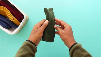 How to neatly fold and organize socks for efficient storage video