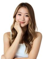 Beautiful asian woman posing with her hand on chin photo