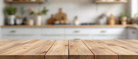 Wooden surface of a table with blurred kitchen background photo