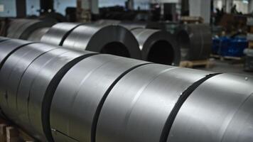 Sheet steel in rolls, in a mini warehouse of a manufacturing company. Workshop for the production of various parts. video
