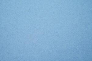Full frame shot of light blue paper sheet texture and background. photo