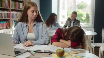 Caucasian girls high school students women gen z teenagers pupils schoolgirls university college education studying problem sleep fall asleep overwork tired exhausted boring lesson learn in classroom video