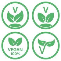Four different vegan labels, including one with a leaf vector