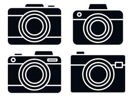 Four black and white cameras on a white background vector