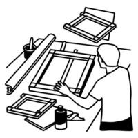 Screen printing process with artisan crafting stencil frame in workshop setting vector