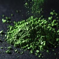 Moringa powder showcasing vibrant green color and fine texture photo