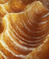 Rich texture of gouda cheese layered in a rustic design photo