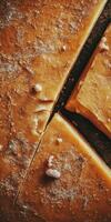 Gouda cheese cut into slices on a wooden surface photo