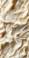 Close-up of creamy brie cheese showcasing its smooth texture photo