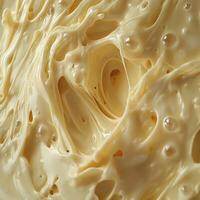 Soft cheese with creamy texture captured in close-up detail photo