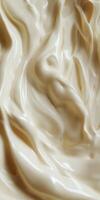 Soft cheese with creamy texture displayed on a white surface photo