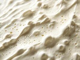 Soft cheese texture featuring creamy and smooth surface details photo