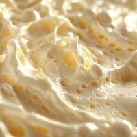 Soft cheese texture highlighted in creamy detail under warm light photo