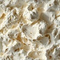 Soft cheese texture close-up reveals creamy consistency and detail photo