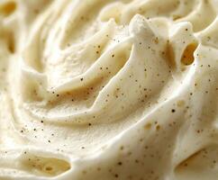 Delightful soft cheese with a creamy texture and subtle specks photo