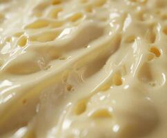 Delicate texture of soft cheese revealed in close up view photo