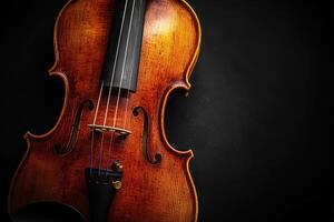 Violin resting against a dark background showcasing craftsmanship photo