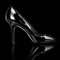 A black and white photo of a high heel shoe