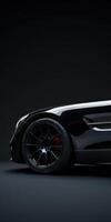 Sleek black sports car showcasing elegant design and sharp features photo