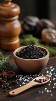 Shilajit in a wooden bowl surrounded by natural elements photo