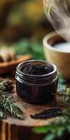Unique shilajit resin in a jar with herbs and calming background photo