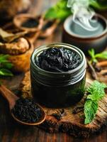 Shilajit resin in a jar with natural elements for wellness photo