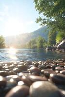 Serene river view with smooth stones and sunlight reflection photo