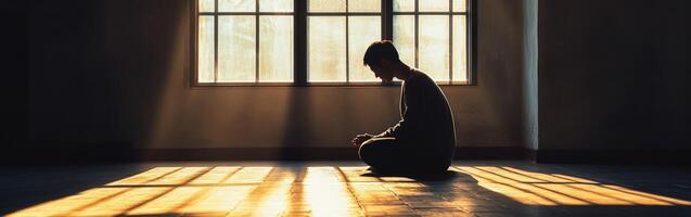 Reflection and solitude in a sunlit room with warm light photo
