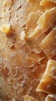 Delicate shards of parmesan cheese create a textured surface ideal for culinary presentations and gourmet dishes photo