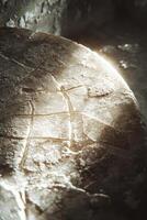 Parmesan cheese aging process with intricate patterns and textures showcased in a rustic setting photo