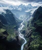 A river runs through a valley between mountains photo