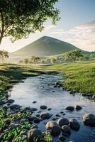 Mountain river flows gently through lush green fields under a bright sky near a majestic hill at dawn photo