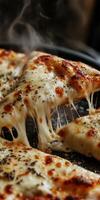 Delicious cheese pizza being served hot from the oven with golden crust and melting cheese photo