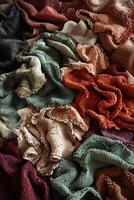 Beautifully arranged textured fabrics in various colors and patterns at a textile studio showcasing vibrant craftsmanship photo